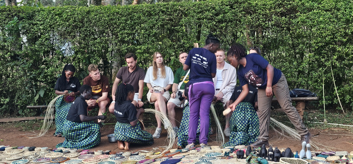 Community empowerment in action: East African women artisans basket weaving and sharing culture with safari travelers